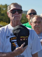 Veteran with hat over his heart, captured at the 2024 Arch Re-dedication Ceremony